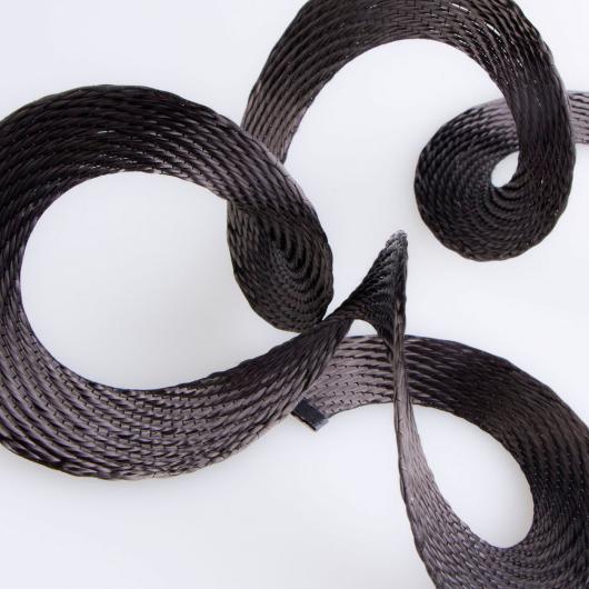 Product: Composites made of spiral woven fabrics