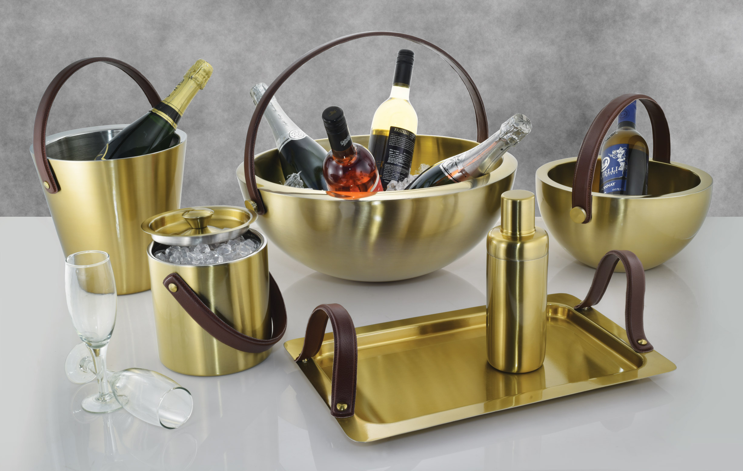 Barware with leather handle and gold coated 