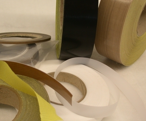 Self adhesive PTFE fibre glass fabrics and films